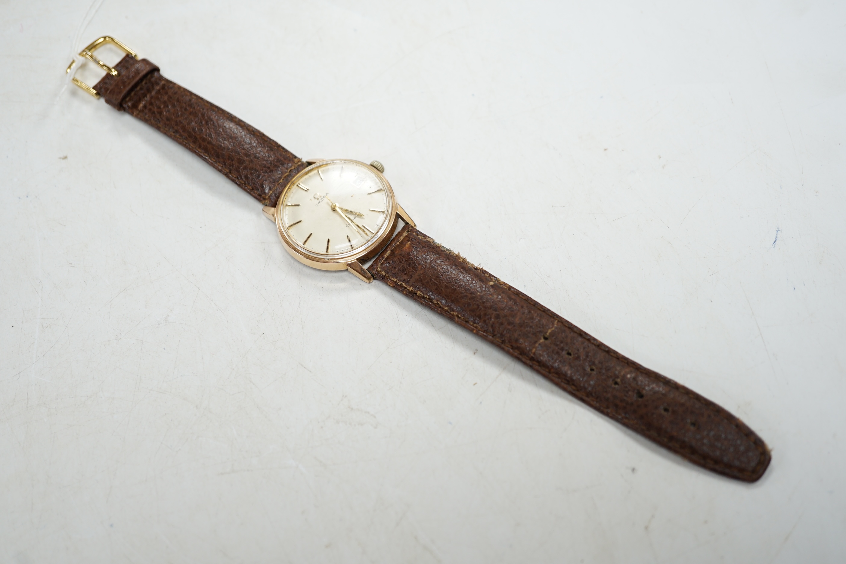 A gentleman's gold plated Omega Seamaster wrist watch, with centre seconds and date aperture. Condition - fair